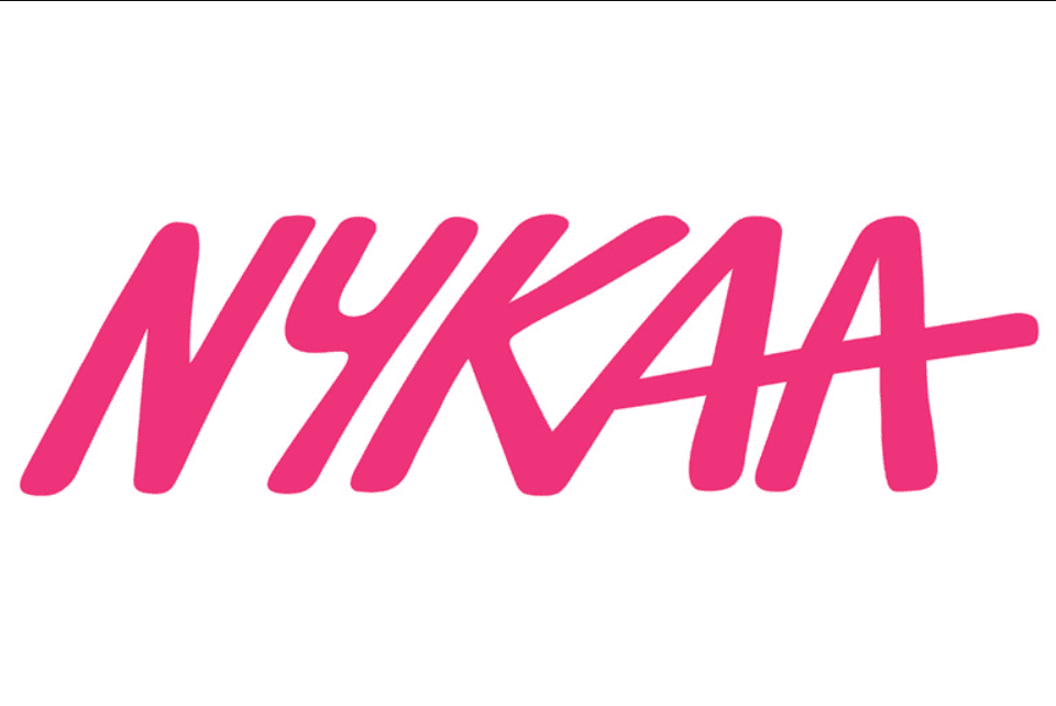 Nykaa store showcasing beauty products and customer interactions in India