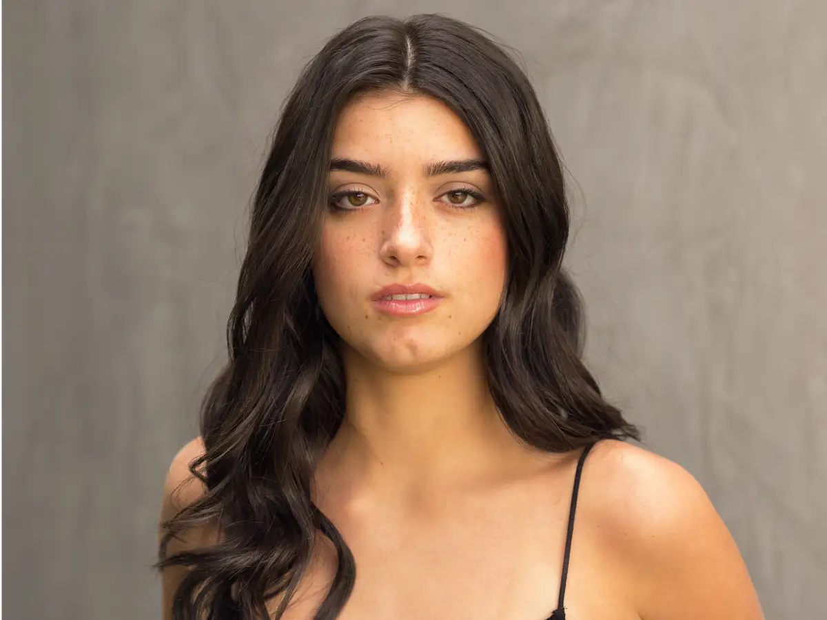 Dixie D’Amelio at a fashion event highlighting her career as a TikTok star, singer, model, and entertainment personality